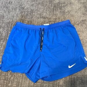 Nike Men's Royal Blue Athletic Shorts with White Swoosh